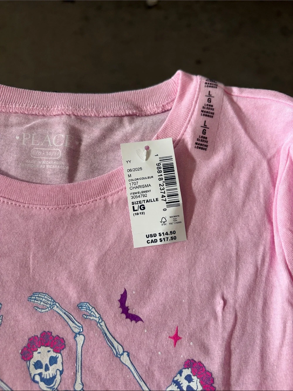 Pink skeleton graph shirt size 10-12